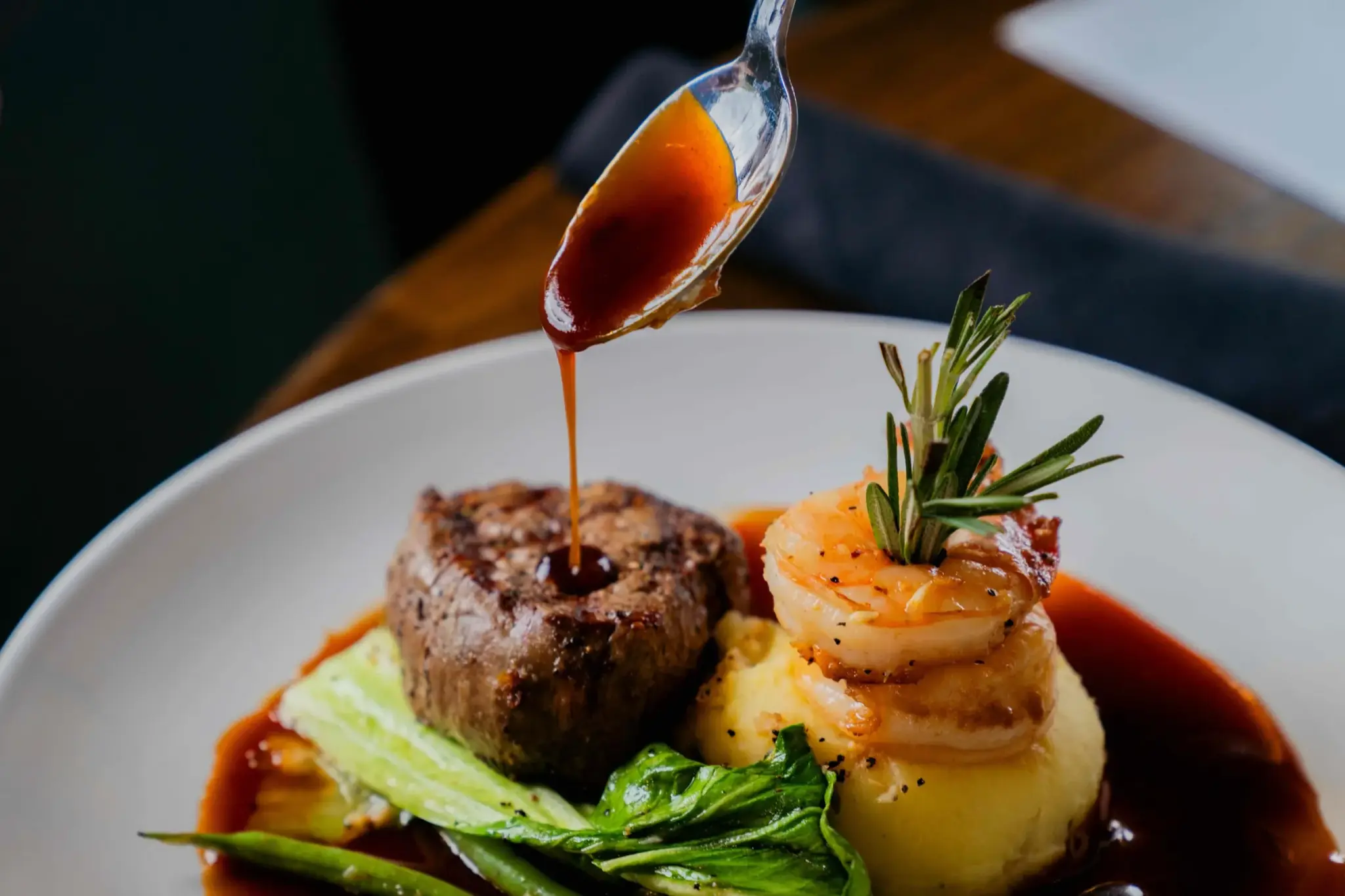 Filet mignon and shrimp finished with a pour of red-wine demi-glace at Jackie Rey's Kona.